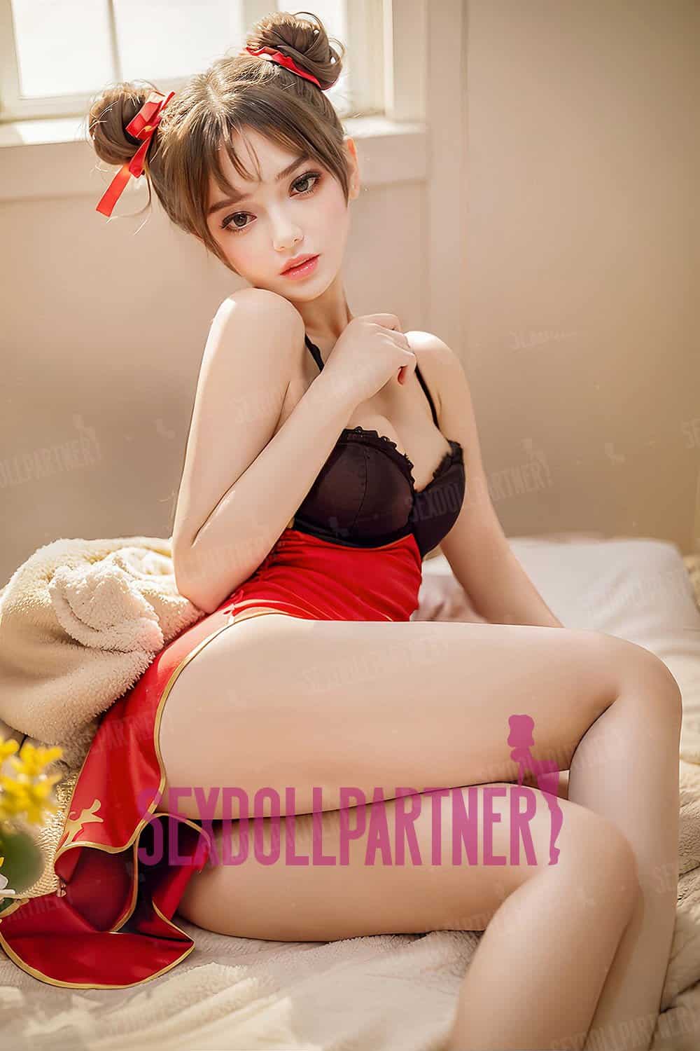 Realistic love doll with detailed features in a cozy bedroom setting.