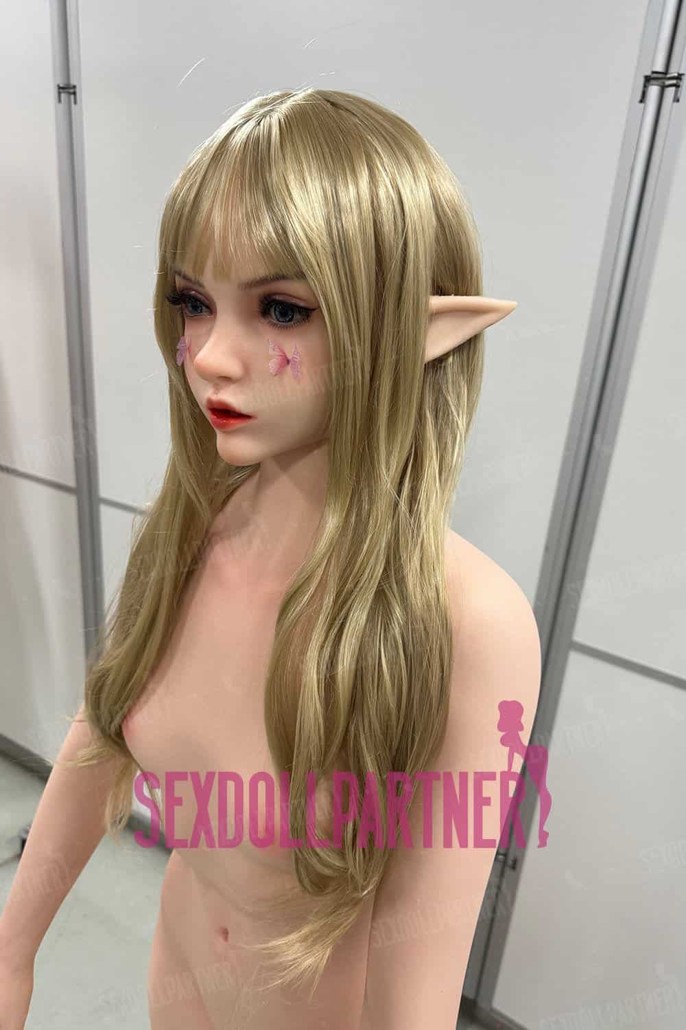 Realistic elf sex doll with long blonde hair and pointed ears for sensory intimacy and companionship.