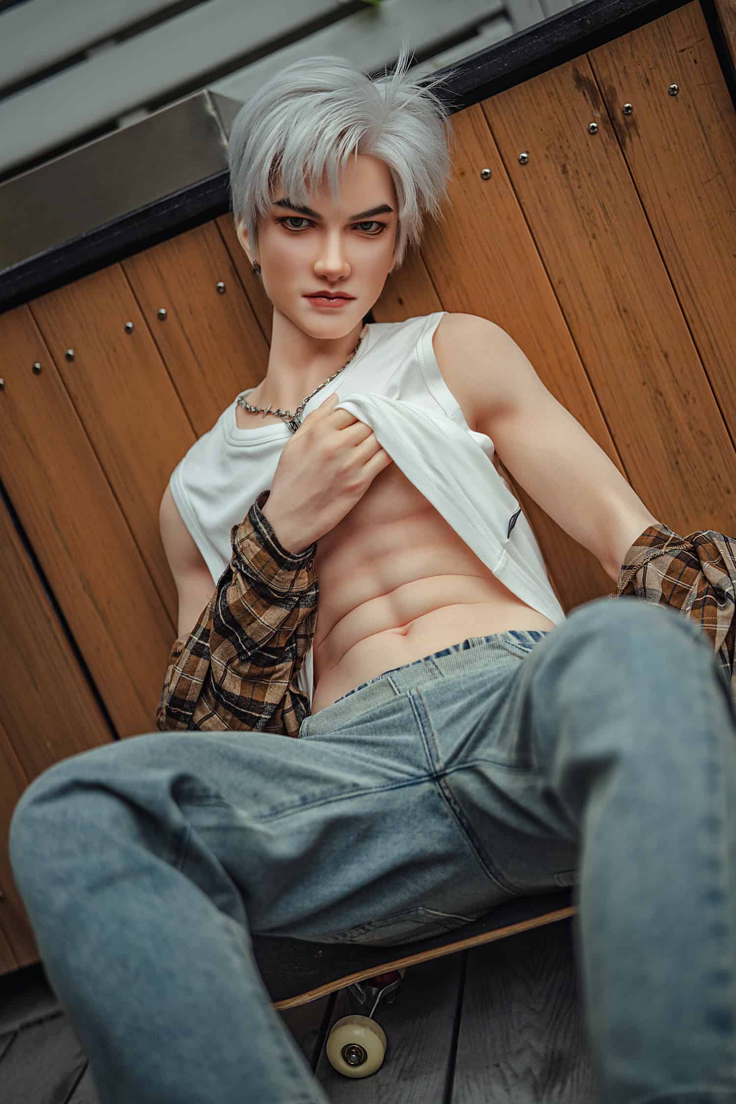Seductive doll model with short platinum hair and casual streetwear pose.
