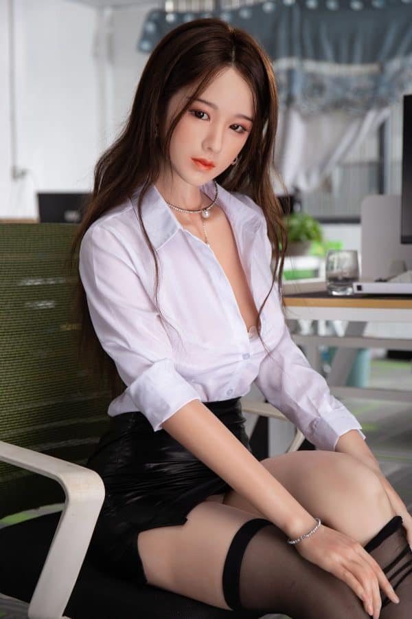 Realistic female doll in office attire for adult pleasure, high-quality sex doll imagery.