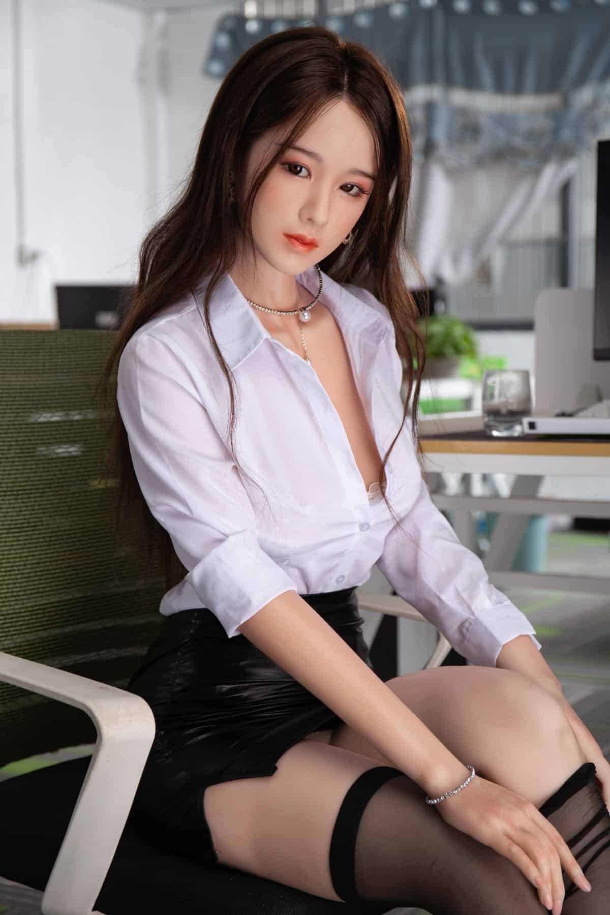 Realistic female doll in office attire for adult pleasure, high-quality sex doll imagery.