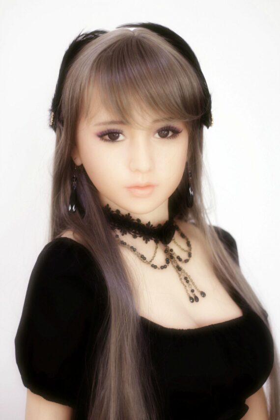 Realistic female doll close-up with detailed makeup and black jewelry from Seducedoll.