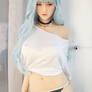 Realistic female love doll with long wavy blue hair posing indoors.