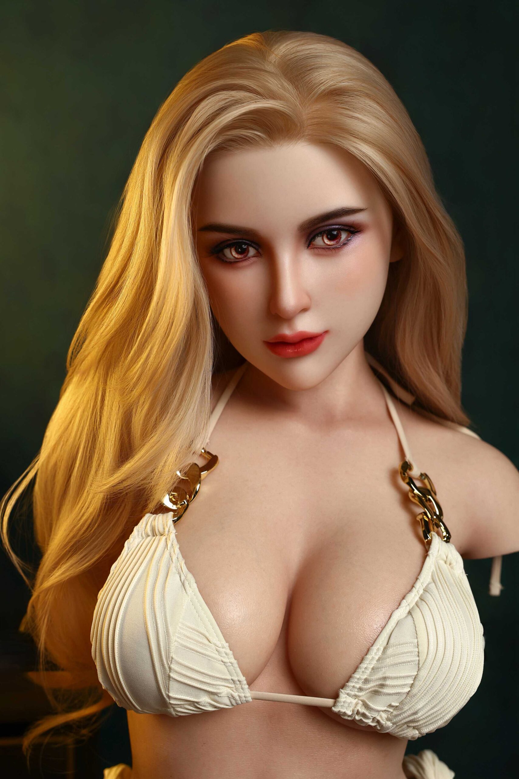 Realistic sex doll with blonde hair and detailed facial features, dressed in a cream bikini top.