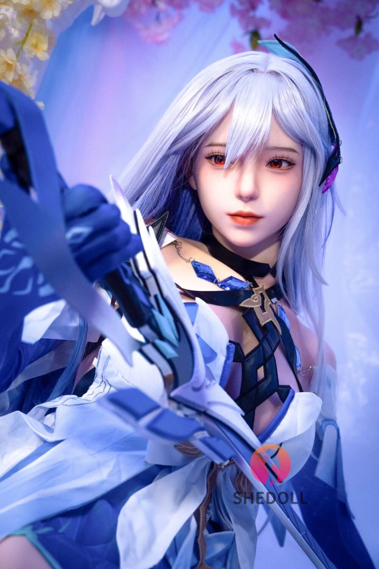 Realistic anime-style love doll with silver hair and detailed costume posing with sword.