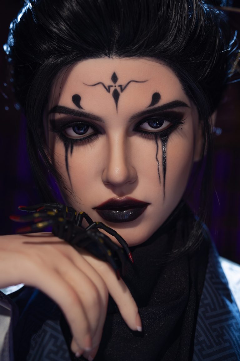 Seductive doll with gothic makeup, black hair, and intricate face tattoos, cosplay fashion, dark aesthetic, sexy gothic woman, seductive dark fantasy image.