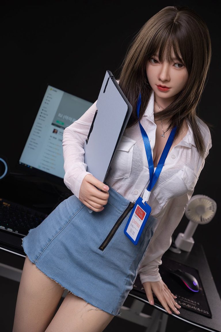 Laptop girl holding a clipboard in a tech office environment.