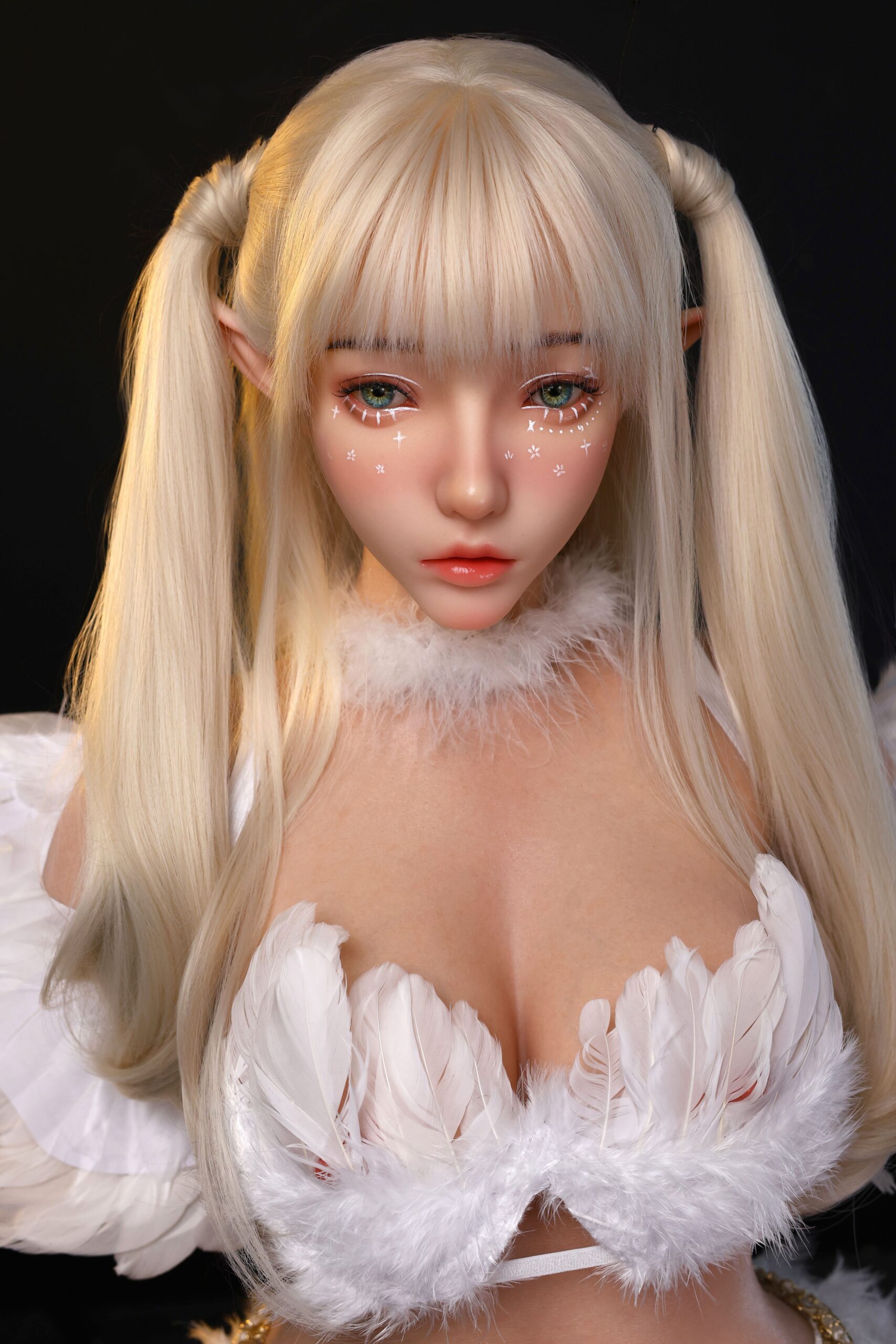 Cute doll with blonde hair and feathered white outfit, perfect for collection and photography.
