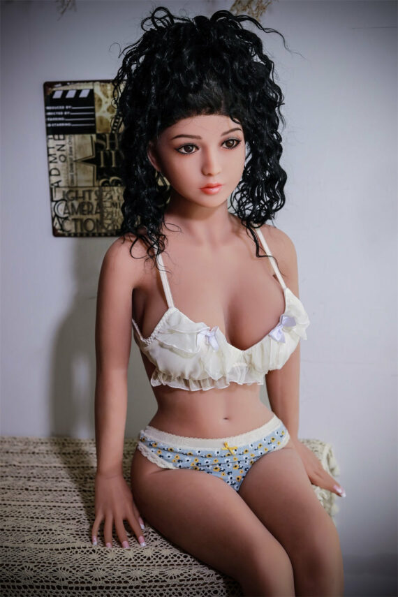 Realistic sex doll with detailed facial features and curly hair posing in lingerie, perfect for adult collectibles.