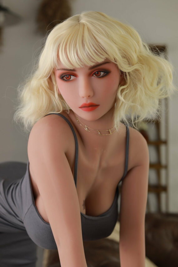 Blonde female doll with detailed features and realistic appearance for adult companionship.