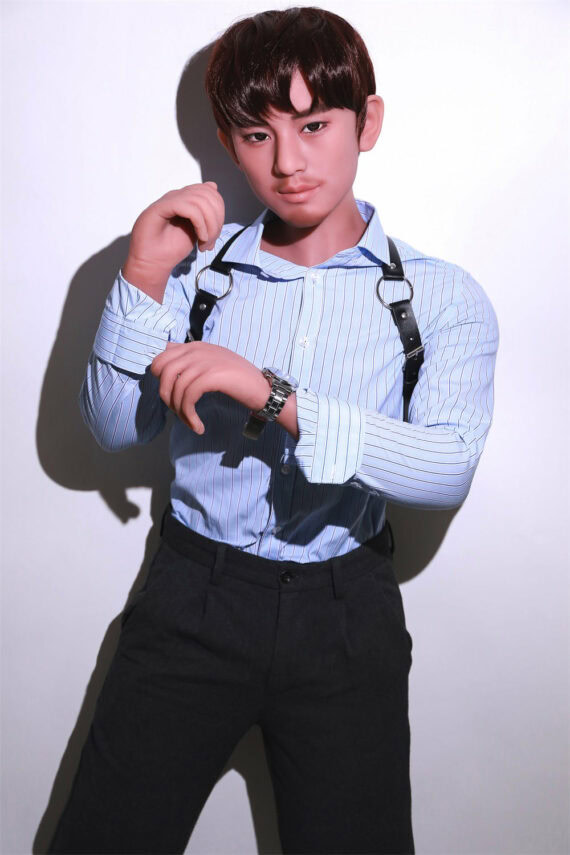 Seductive doll male sex doll in stylish outfit posing confidently.