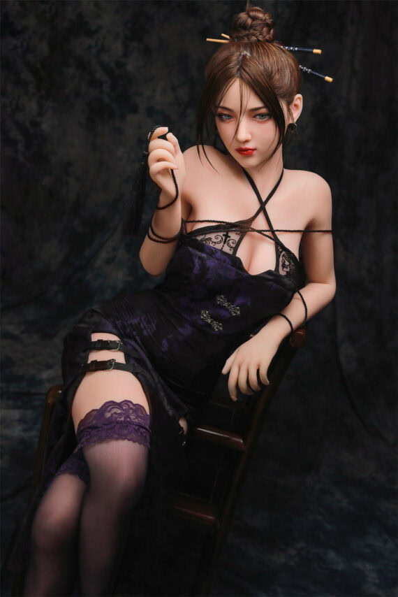 Seductive doll girl in black lingerie with thigh-high stockings and hair accessories.