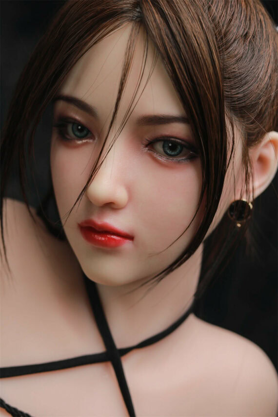 Realistic female love doll head with detailed facial features and expressive eyes.