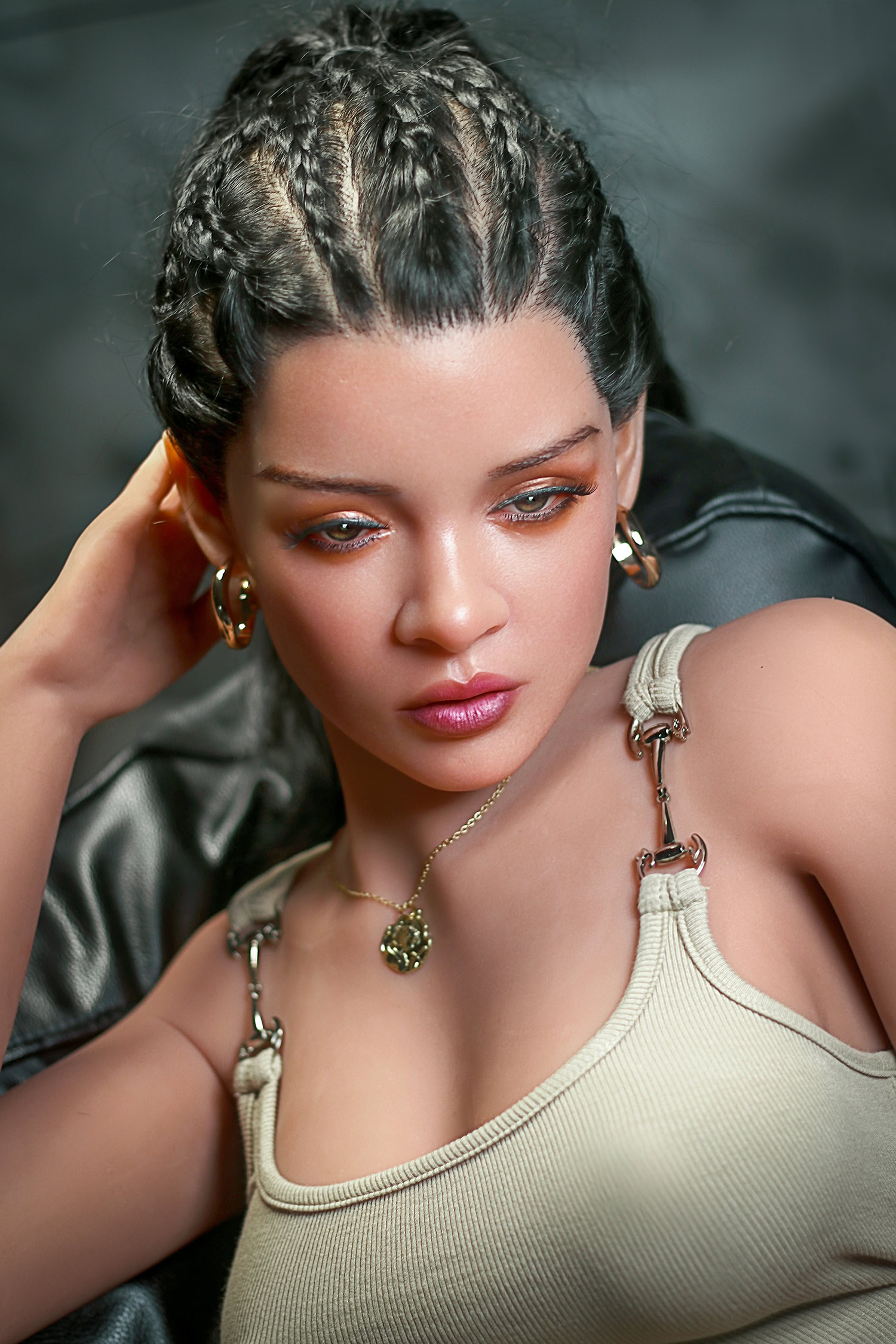 Silicone love doll with braided hairstyle, wearing tank top and jewelry, close-up portrait.