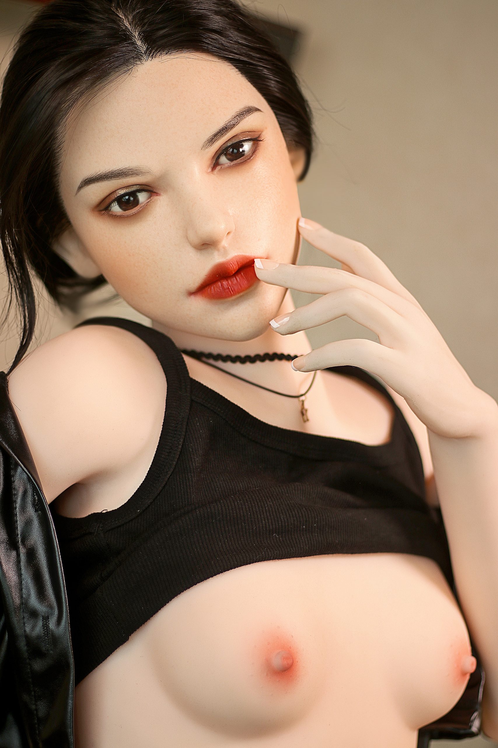 Seducedoll realistic love doll woman with makeup and black tank top, intimate human-like sex doll for immersive experience.