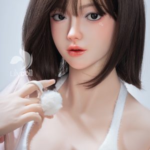 Realistic female love doll with detailed facial features, brown hair, and soft skin.