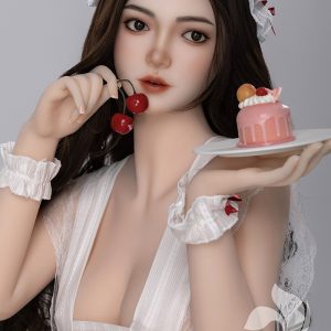 Cherry-themed doll with a pink cake and white lace outfit for realistic, erotic doll experiences.
