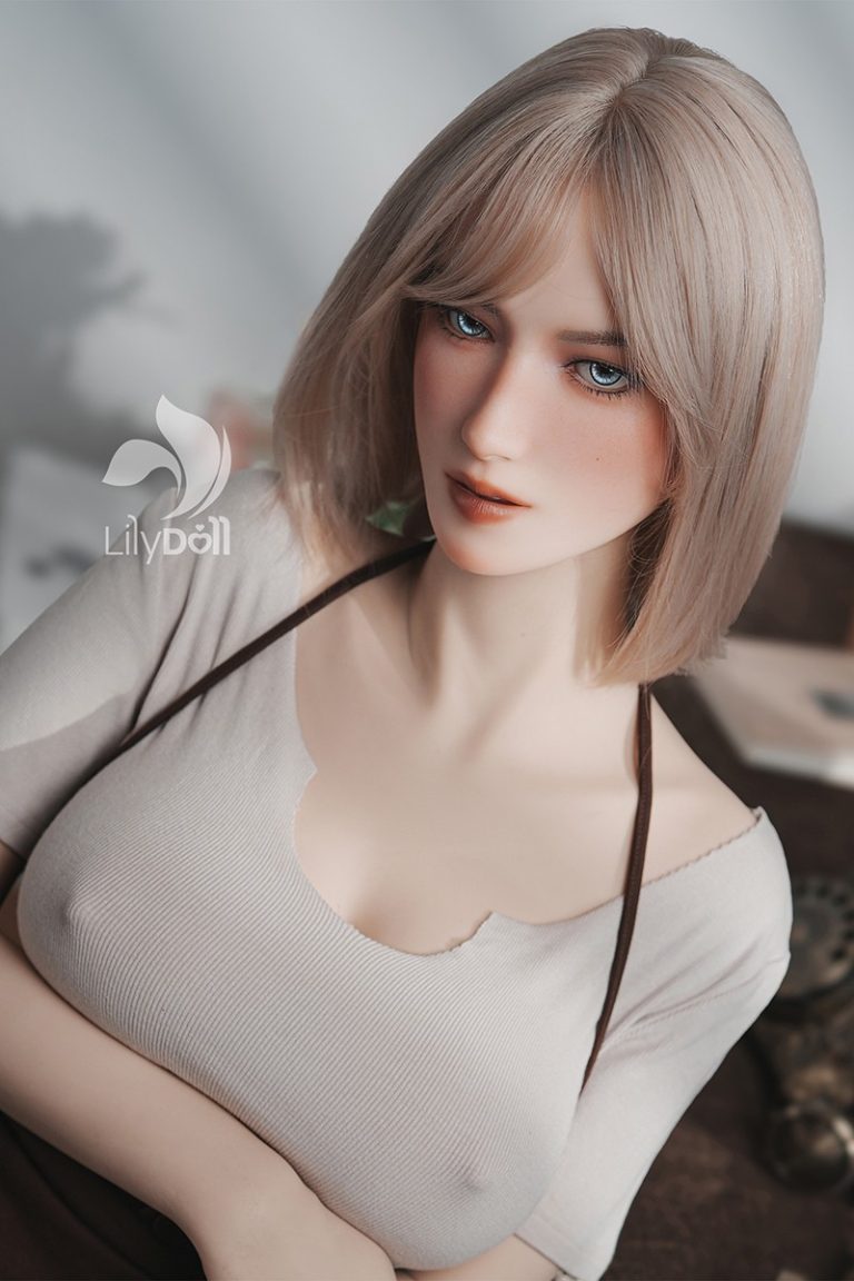 Gorgeous lifelike female sex doll with blonde hair and realistic features for adult companionship.