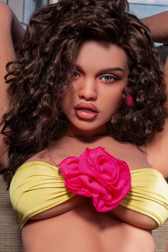 Seductive doll woman with curly hair and colorful outfit for adult pleasure images.