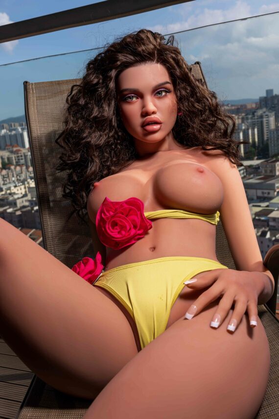 Seducedoll realistic love doll with curly hair and expressive eyes, on a balcony in the city.