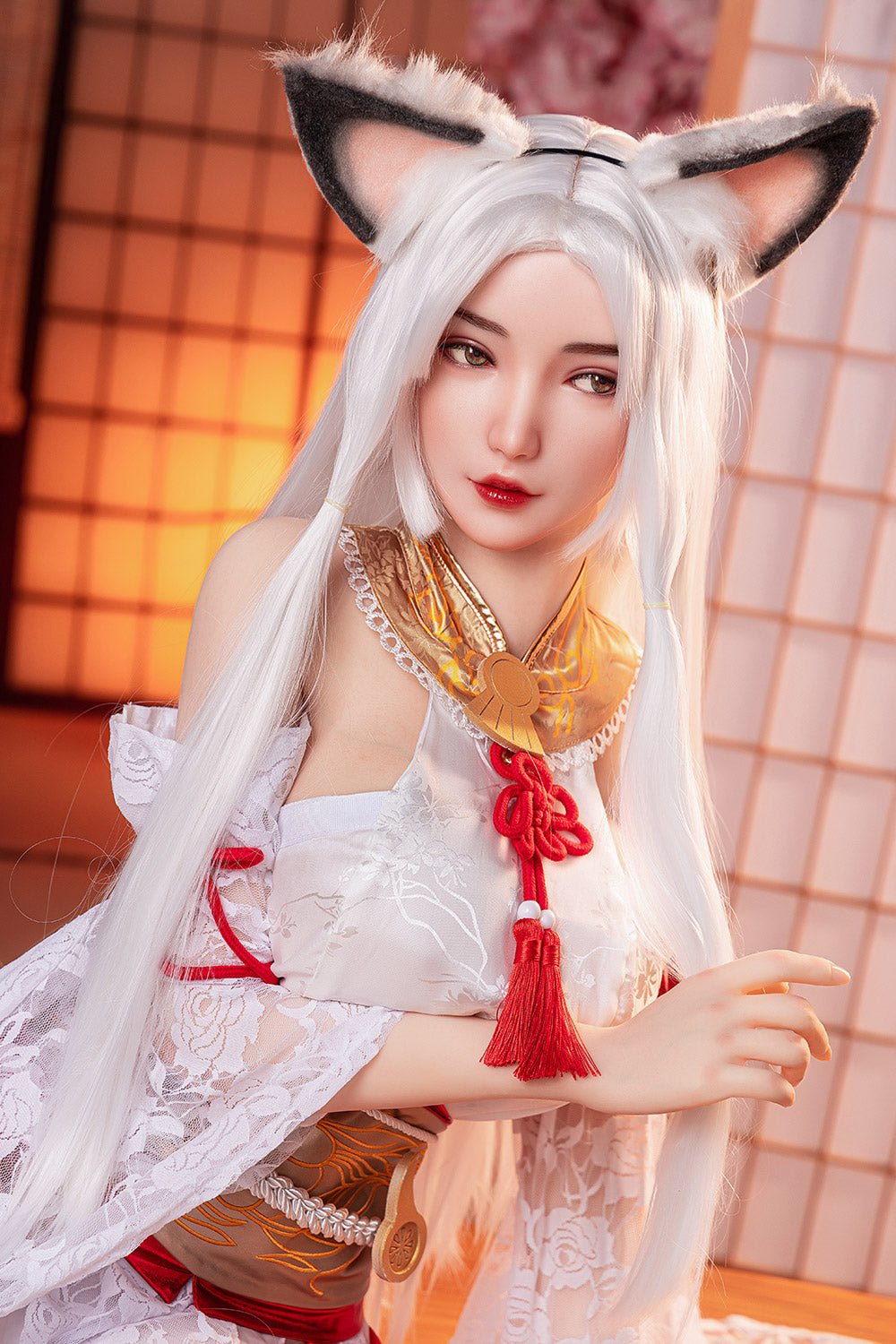 Beautiful anime-style doll with fox ears, white hair, and traditional Asian-inspired attire, posing indoors.