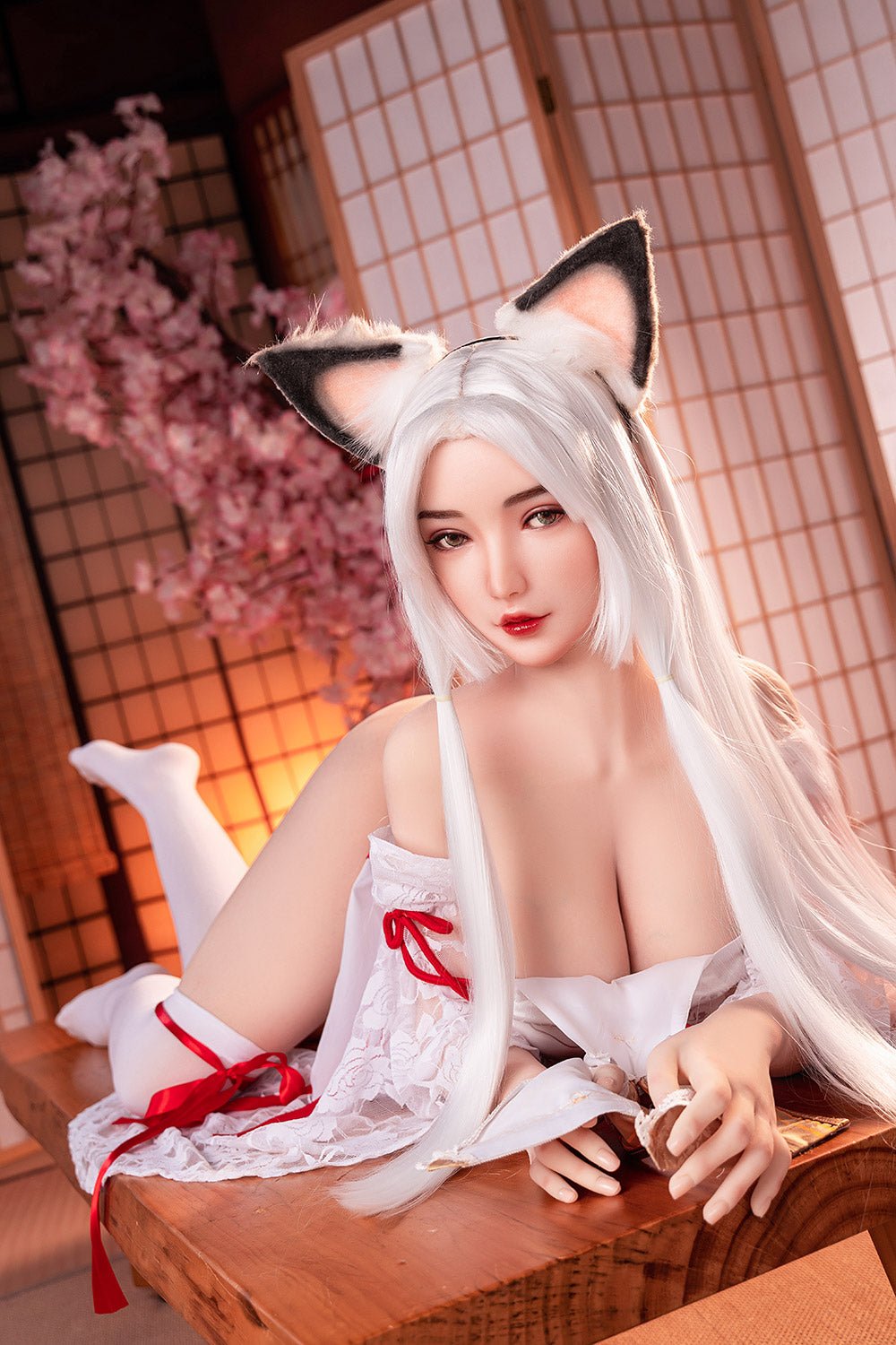 Cute anime-style girl with fox ears in a Japanese-inspired room, dressed in feminine cosplay outfit.
