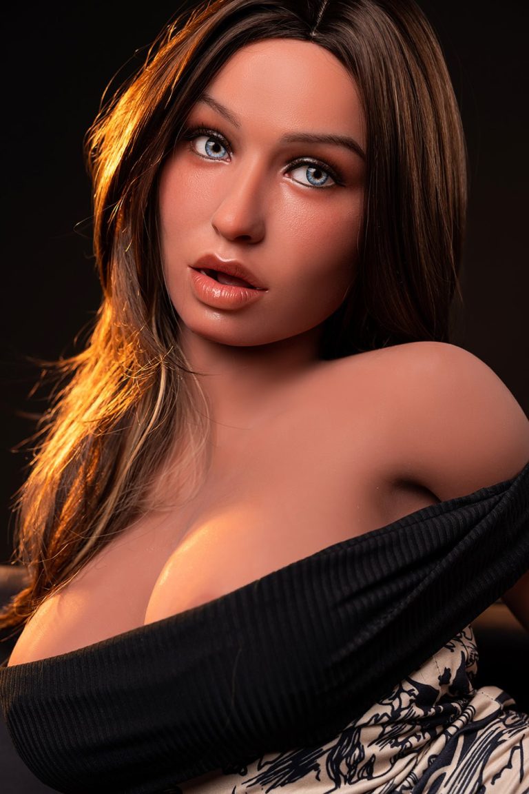 Silicone female sex doll with realistic features and striking blue eyes.