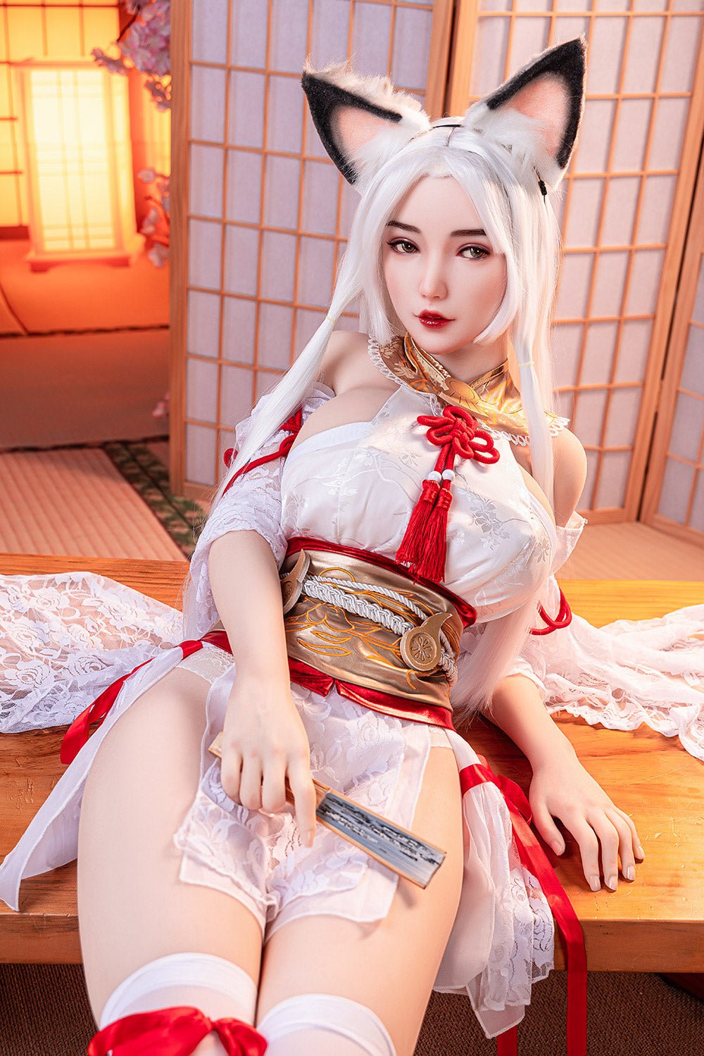 Silicone cosplay doll as a sexy kitsune character in traditional Japanese attire, with fox ears, lying on a tatami mat.