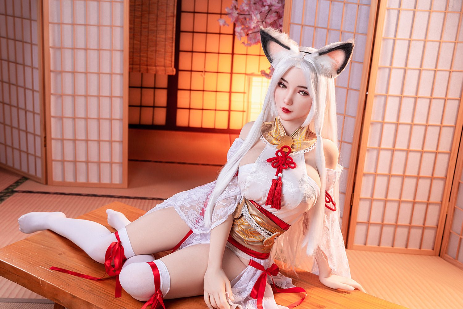 Silicone doll with fox ears in Japanese-inspired kimono pose on traditional tatami mat.