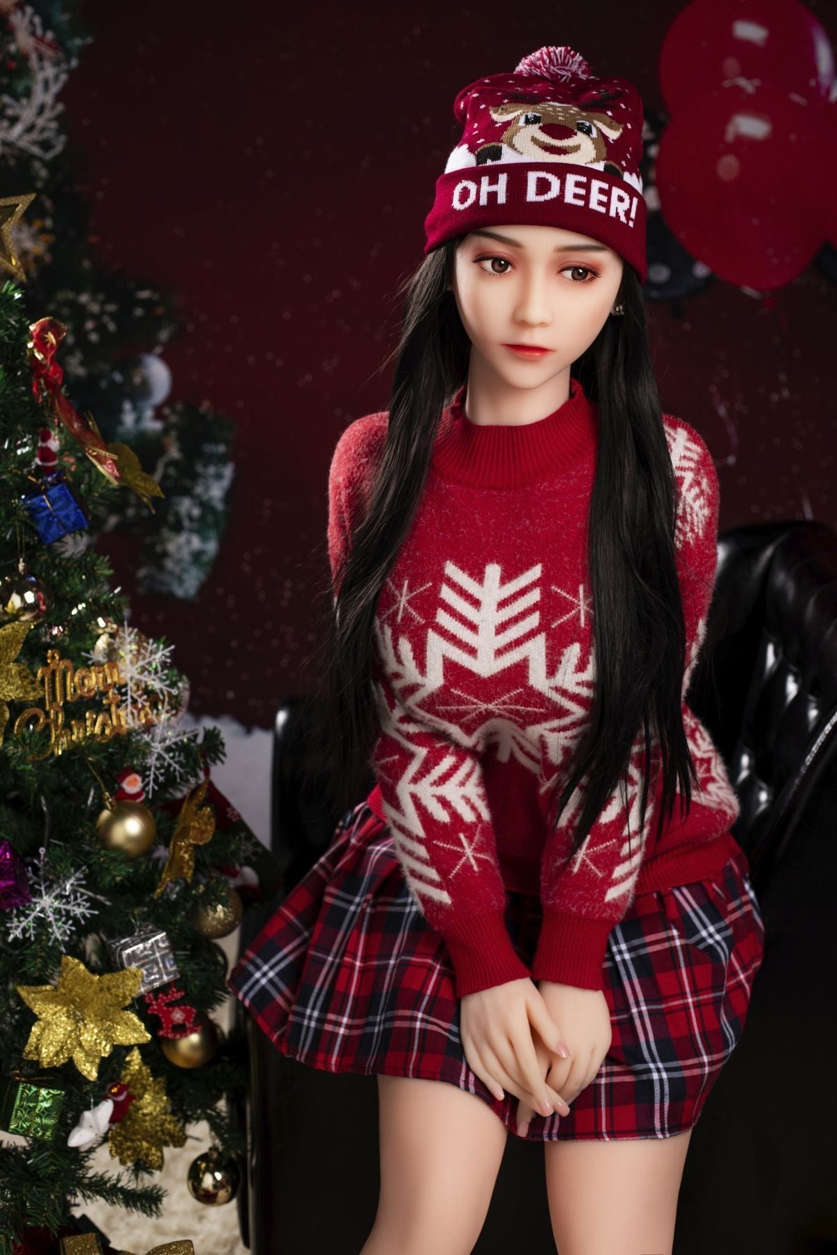 Realistic female doll dressed for Christmas with festive sweater and hat, holiday decorations, Seducedoll product.