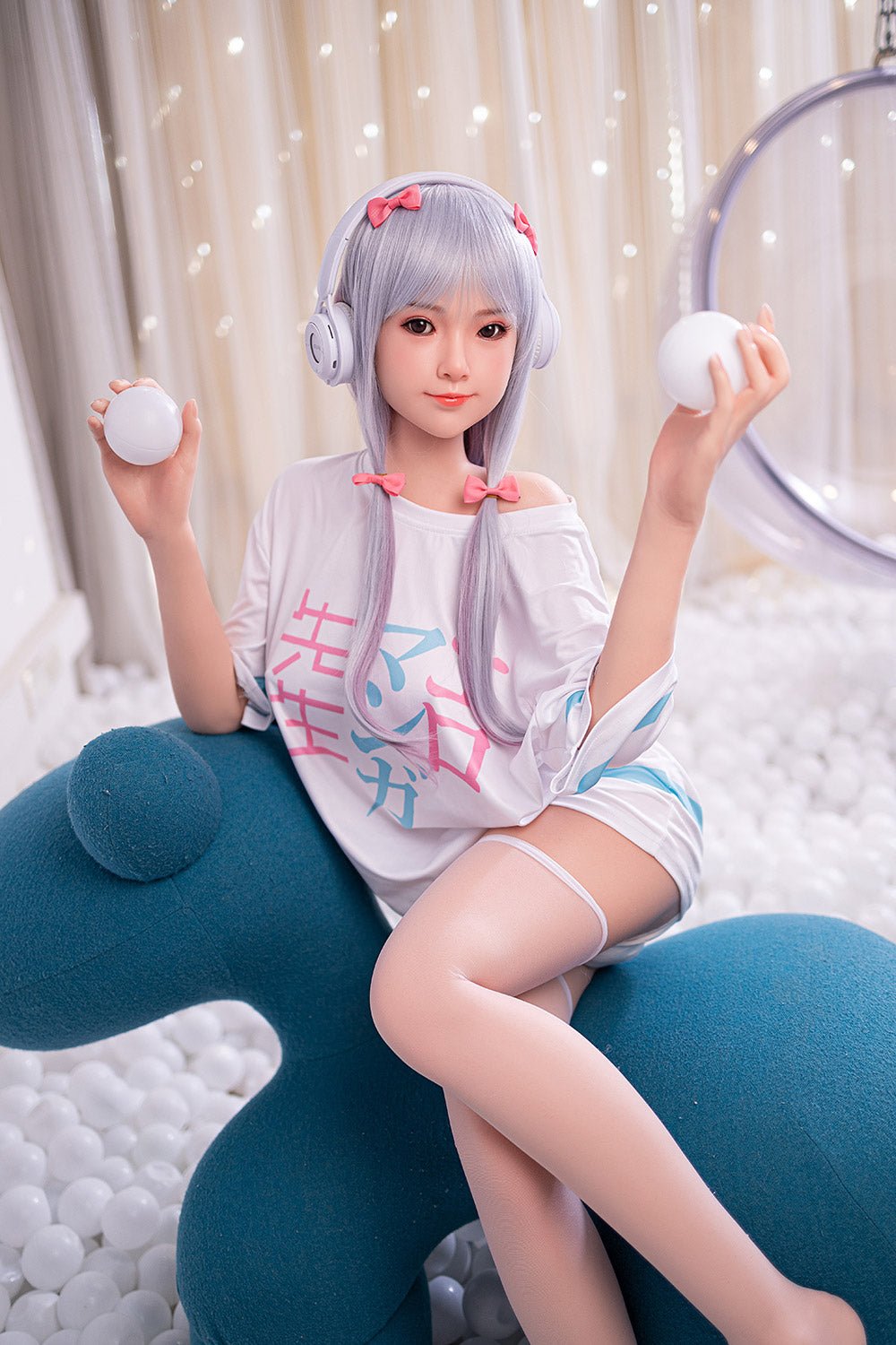 Cute sex doll with silver hair, headphones, and casual outfit, sitting on a playful blue dog-shaped chair.
