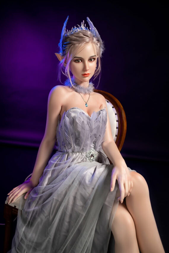 Elegant fantasy doll with elf ears and a flowing silver dress, seated on a vintage chair, illuminated in purple lighting.