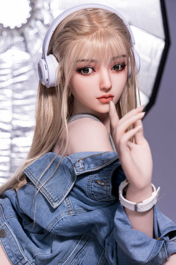 Silicone sex doll with headphones, realistic female figure for adult companionship and pleasure.