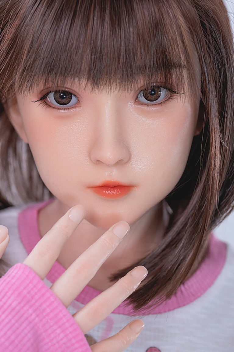 Realistic sex doll with detailed facial features and brown hair, perfect for companionship and adult intimacy.